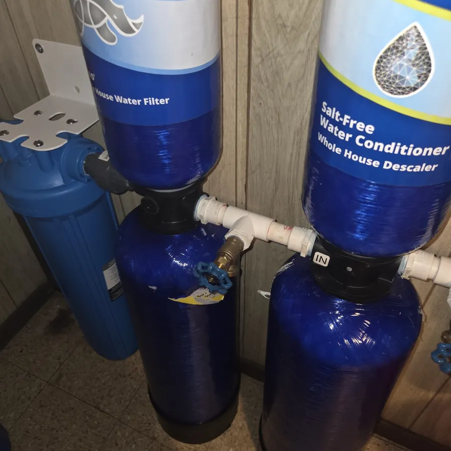 Whole-house water filter and salt-free water conditioner tanks